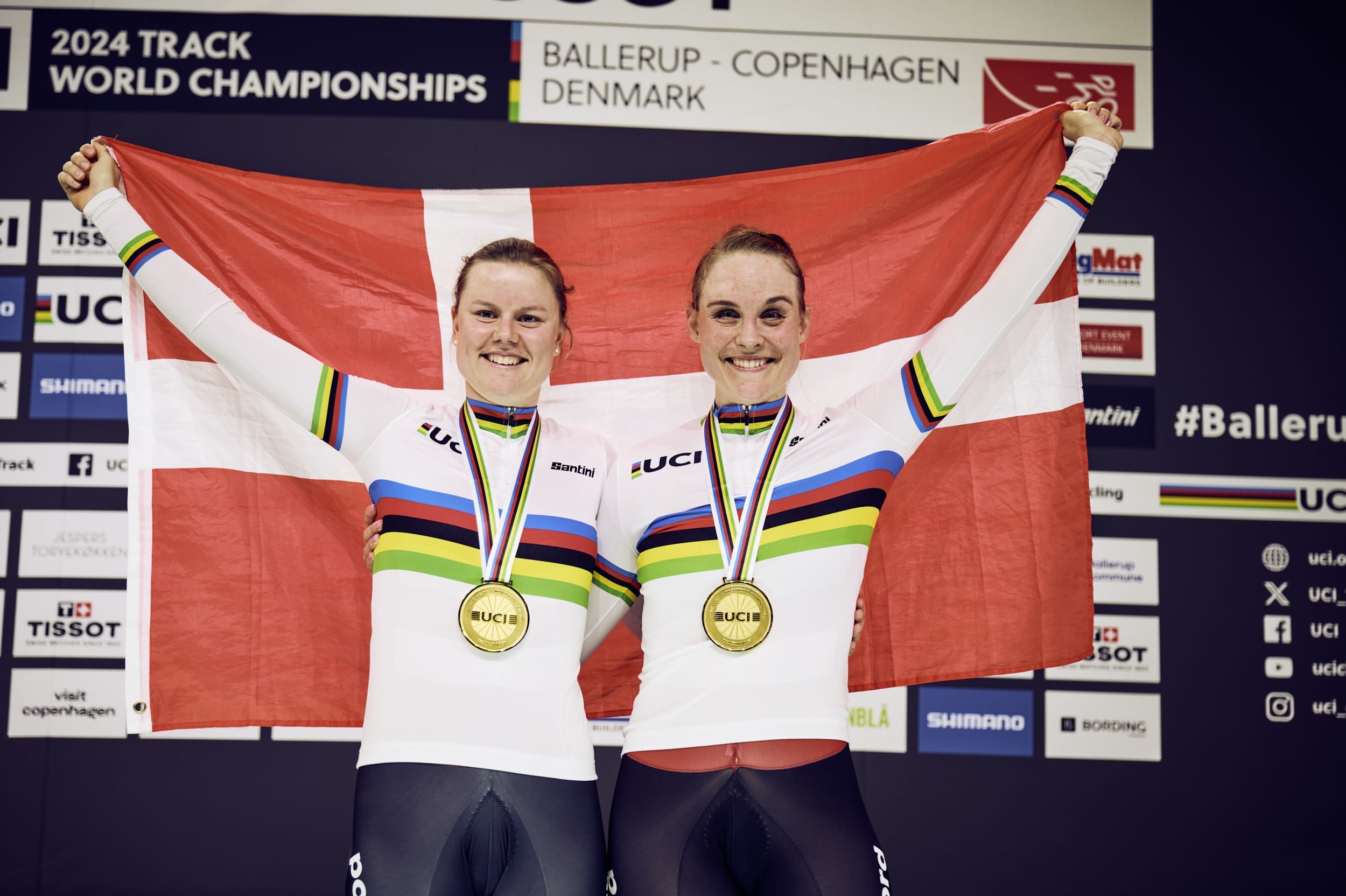 Amalie Dideriksen and Julie Leth celebrate their gold medal victory in the Madison at the UCI Track World Championships